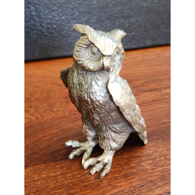 This small metal owl is only 3" tall but weighs over 1/2 pound. It is heavy and a strongly created figure of an owl. Look...