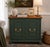 This solid wood cabinet has been thoughtfully refinished in a sophisticated olive green satin finish and paired with a...