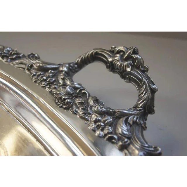 Sheffield tray with beautiful handles. 19" x 30". The flat area on the tray is 19 1/2” by 13 1/2”. The tray is made by...