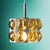 Exceptional and rare pendant lamp from the 1960s by the renowned manufacturer temde in austria. The handcrafted lampshade...