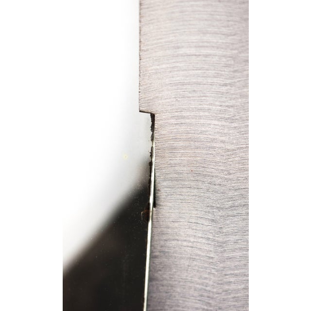 "Wave" mirror designed by Burchiellaro in the 70s, an authentic example of Italian design. Made in Italy with an engraved...