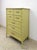 Bring timeless tropical and Hollywood Regency elegance to your space with this vintage Henry Link “Bali Hai” tallboy...