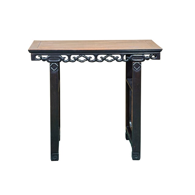 This elegant Chinese altar table (or wine table) showcases classic Qing-dynasty design principles, balancing a structured...