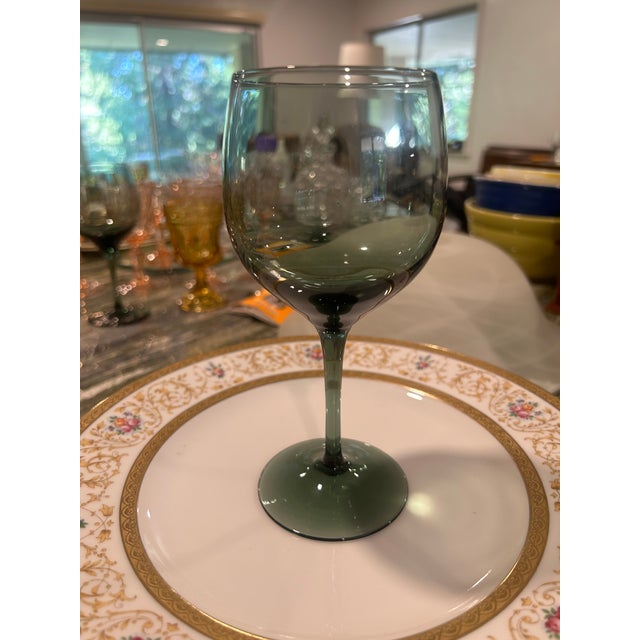 This set of 12 glasses is a stunning example of classic mid century modern blown glass design. I have examined all the...