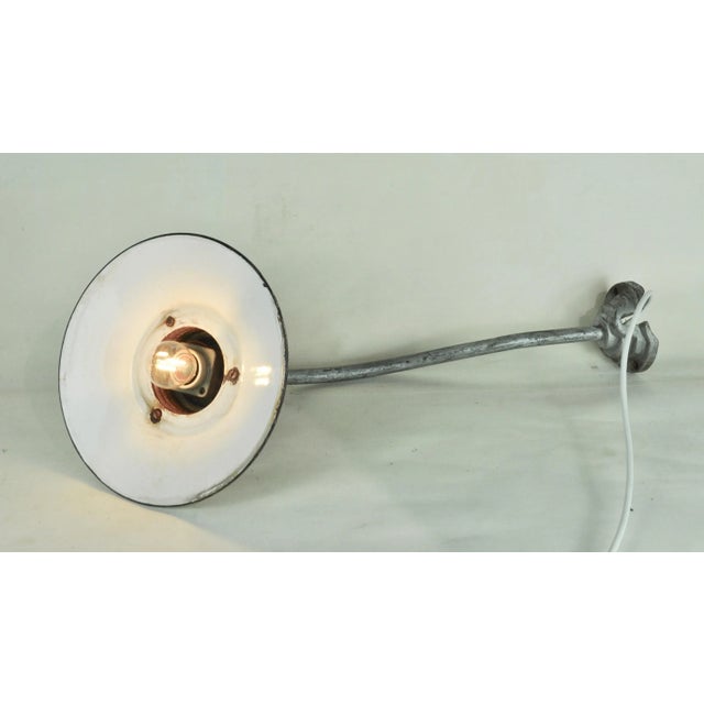 Outdoor Metal Focus White Iron, 1940s, in Good conditions. Designed 1920 to 1949 European Plug (up to 250V).The wiring of...