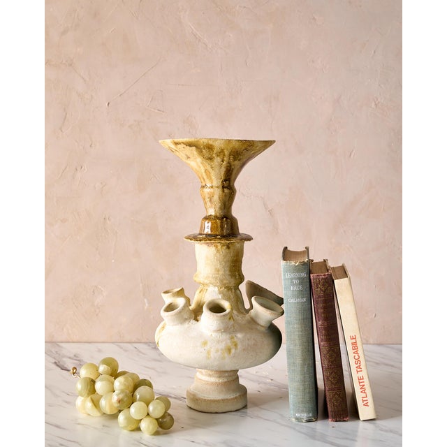 Gorgeous stoneware vase with a white and coffee glaze, this unique design is a perfect vessel for an off-beat overflowing...