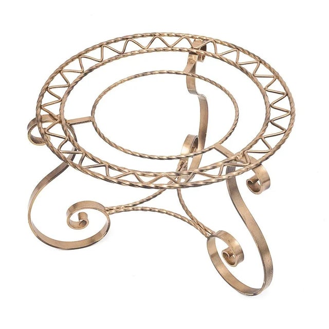 Golden wrought iron coffee table. Porcelain tray. Emaux de Gien. Decorated by hand. Soft diameter: 46 cm Circa 1960