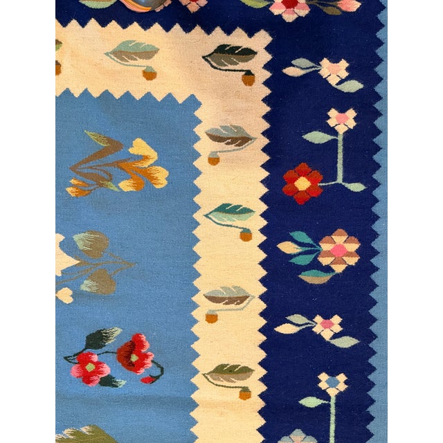Mid-20th Century Romanian Oltenian Folk Art Floral Wool Kilim Rug in Blue and Navy For Sale - Image 9 of 9