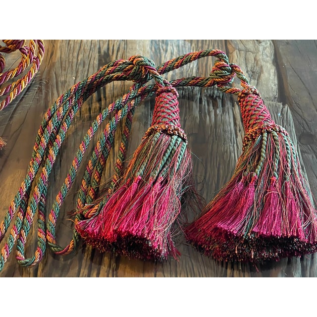 Pair of large raspberry red with green silk Tiebacks with tassels.