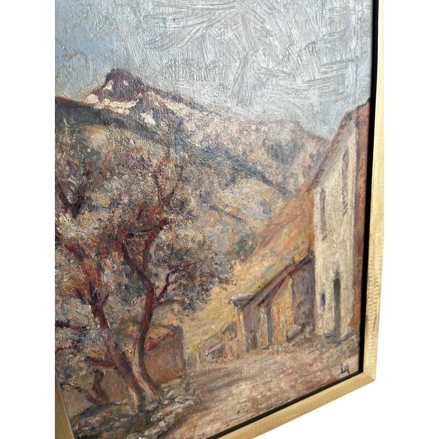 A charming late 19th century Impressionist oil painting depicting a quiet village street set against a backdrop of rolling...