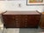 Design Plus Gallery presents a Dark Walnut Sideboard from Henredon. A magnificent piece for your dining area or kitchen...