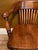 This stunning antique solid oak banker's chair by the W.H. Gunlocke Chair Company of Wayland, New York, perfectly balances...