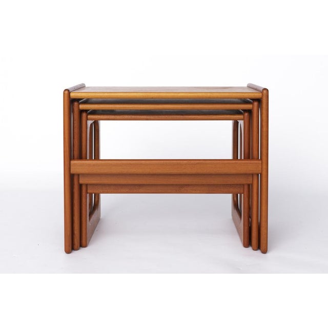 Set of Teak Nesting Tables, 1970s Danish Design Elegant set of teak nesting tables from the 1970s, showcasing timeless...