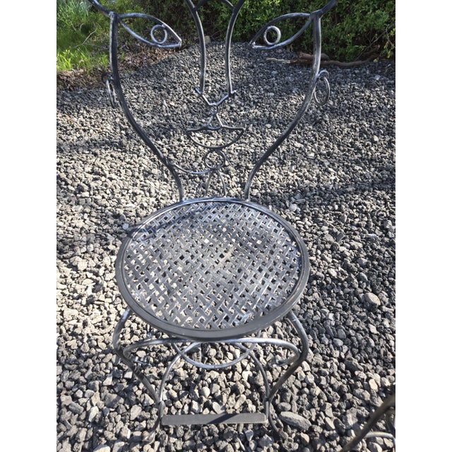 Elevate you indoor or outdoor space with this set of Hers & Hers Wrought Iron Bar Stools. Perfect for any deck, garden,...