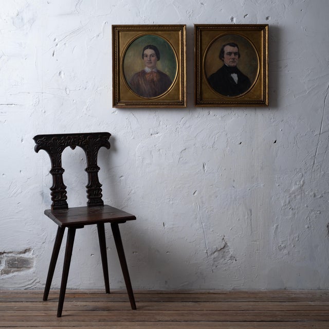 A pair of American portrait paintings, 19th century. sight: 12 by 14 inches frame: 16 ¾ by 18 ½ inches