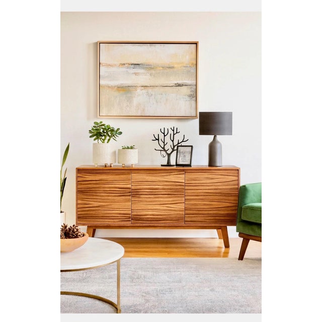 Mid century modern style credenza made using pine wood and parota wood veneer. Light and sturdy construction Note: wood...
