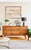 Mid century modern style credenza made using pine wood and parota wood veneer. Light and sturdy construction Note: wood...