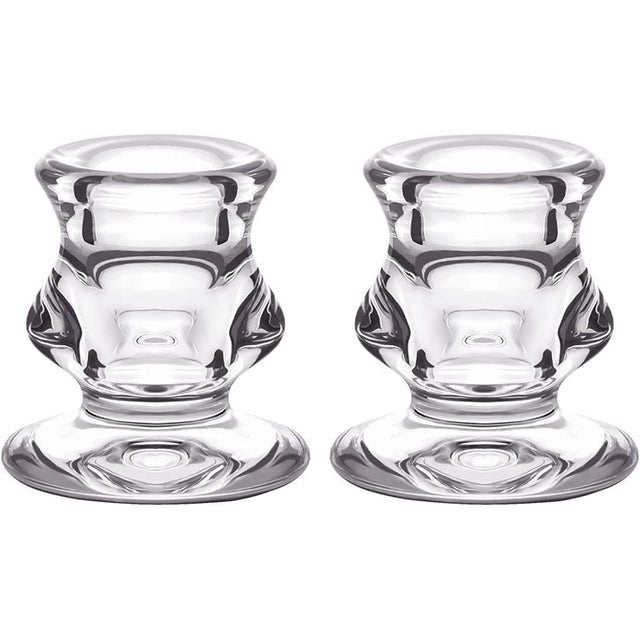 Add a touch of refined simplicity to your décor with this set of two glass candlestick holders. Each piece stands 2.44...