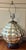 Mid-Century Modern silvered mercury glass table lamp circa 1950. Bulbous shape with many reflective surfaces. Measures 25...