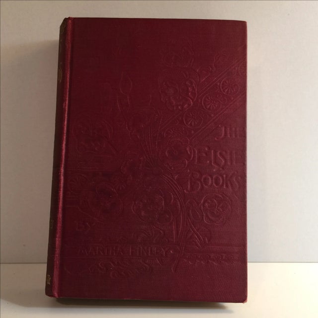 Pretty antique hardcover book with illustrated frontispiece. Embossed cloth boards with gilt lettering on spine. New York:...