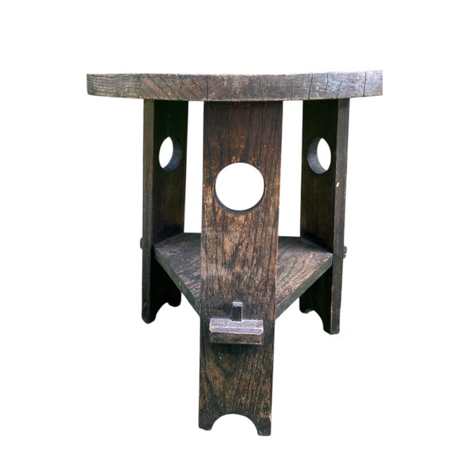 A naturally distressed mission arts and crafts low side table or Tabouret with pegged construction in the manner of Gustav...