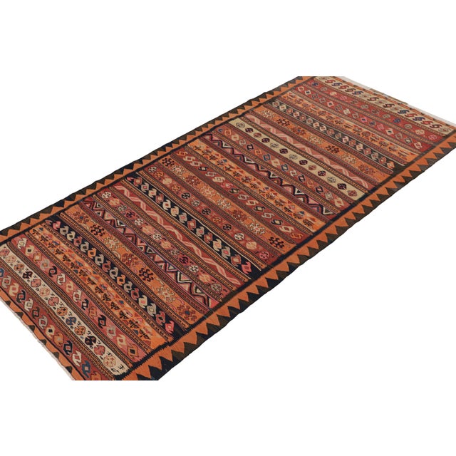 This vintage 5x11 Persian Kilim is believed to be a Shahsavan tribal rug, handwoven in wool circa 1950-1960. Further on...