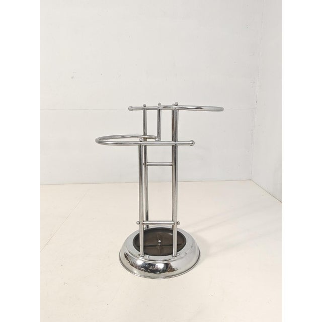 This beautiful and rare umbrella stand from the 1920s and 1930s is designed in the Streamline Modern style of Art Deco....