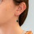 Rich London blue topaz gemstones meet warm rose gold in these oval earrings, accented with brilliant diamonds in solid 14K...