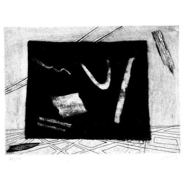 This original black and white etching is hand-signed in pencil on the lower right. Numbered on the lower left. Edition of...
