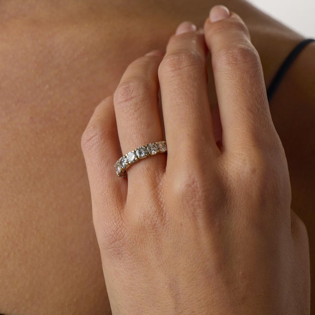 This vintage diamond eternity band is a beautifully classic piece from the 1990’s, crafted in 18k white gold with a...