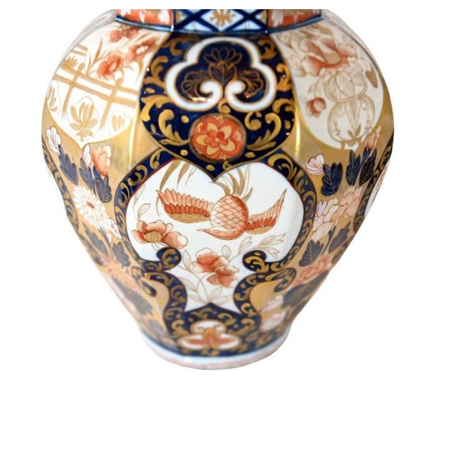 Fine decorative pair of Japanese Imari porcelain temple jars with covers Of traditional baluster form with domed lids...