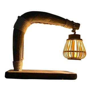 Mid-Century Reclaimed Ox Yoke Table Lamp — Hand-Forged Iron & Rattan Shade For Sale