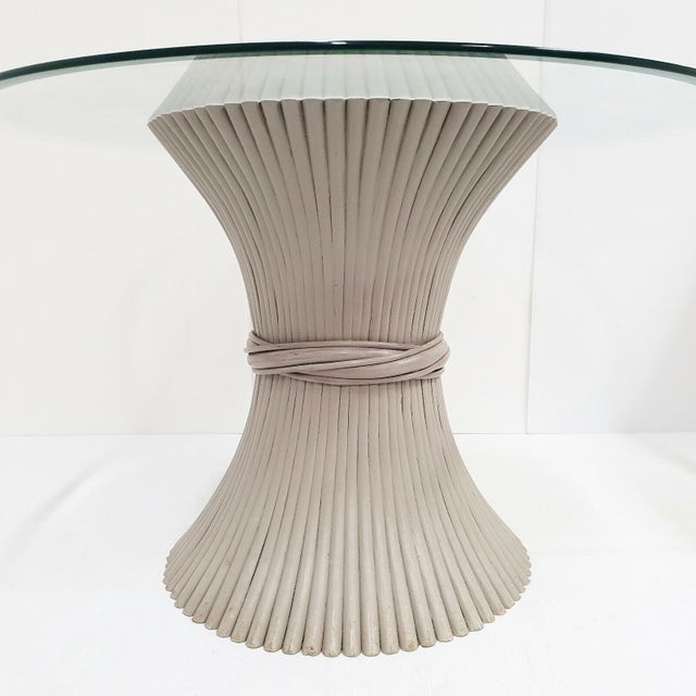 Good overall condition. The 111.5 cm diameter (and 0.8 cm thick) beveled glass top is in good condition and very well...