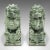 This is a pair of antique Oriental bookends. A Chinese, jade marble decorative 'Dog of Fo' book rest, dating to the late...