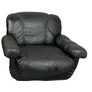 Space Age Italian Black Leather Lounge Chair with Brass Buttons and Cord Lacing, Italy, 1970s For Sale