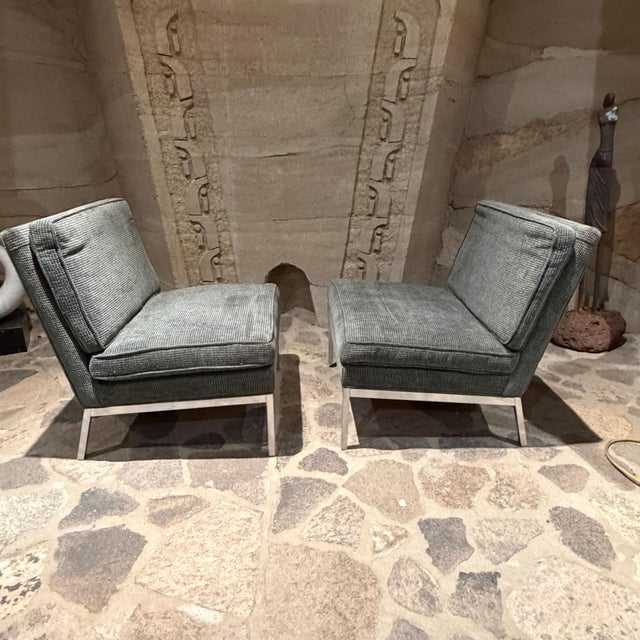 For your consideration, a pair of mid-century modern armless slipper lounge chairs. These are designed by Florence Knoll...