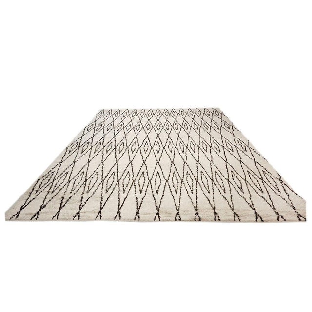 Condition: Vintage Circa: 1980s Origin: Morocco Design: Beni Ourain Modern Actual Size: 12'0 x 18'0 Thickness: 1" Color:...