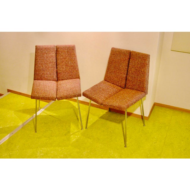 A jewel of mid-century French design, it combines clean lines, innovative form, and timeless elegance. Reupholstered by a...