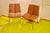 A jewel of mid-century French design, it combines clean lines, innovative form, and timeless elegance. Reupholstered by a...