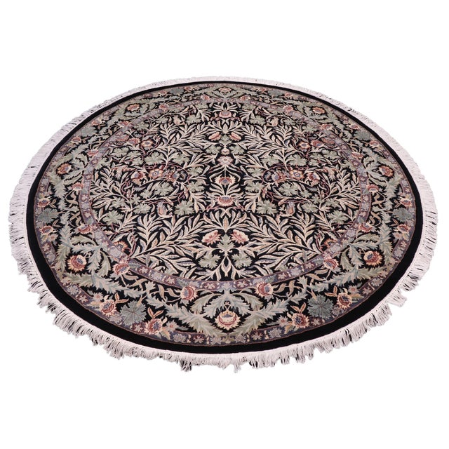This hand‑knotted Pak Persian round rug showcases the finest expression of traditional Persian artistry. Each piece is...