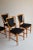 Set of 4 1950s Swedish Dining Chairs. Beautiful curved and elegant design with a contrast black linen upholstery. The...