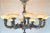 Elegant 10-arm solid bronze chandelier with genuine alabaster shades, made in Spain. Perfect for luxury dining rooms,...