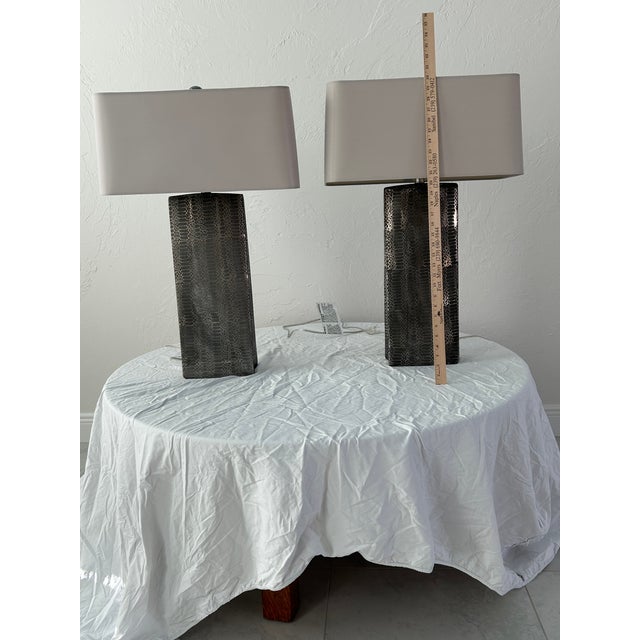 Illuminate your living space in elegant style table lamps, skillfully combines style and stability in one visually...