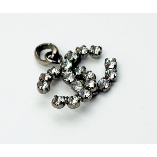 Chanel Silver CC Rocky Crystal Pendant *Marked 00 *Made in France -It is approximately 0.9" x 0.55". -In an excellent...