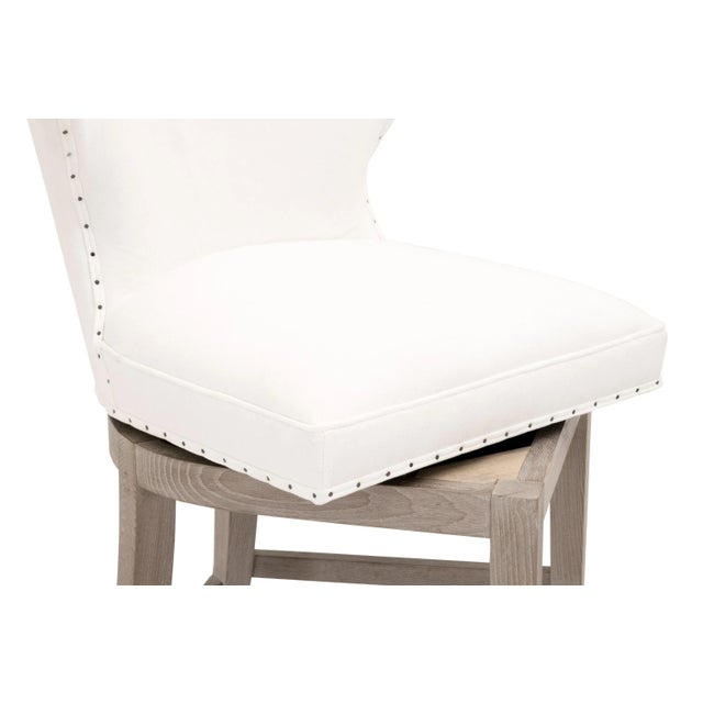 It's all the fine details that make this transitional counter stool so beautiful. From the white upholstery, to the...