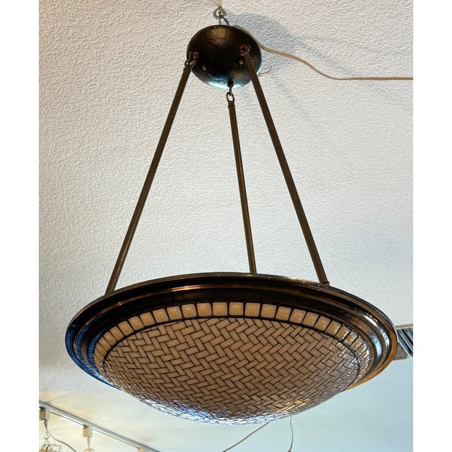 Design Plus Gallery presents the Woven Dome Tiled Pendant from Hilliard Lamps. The dome features hundreds of hand-cut...