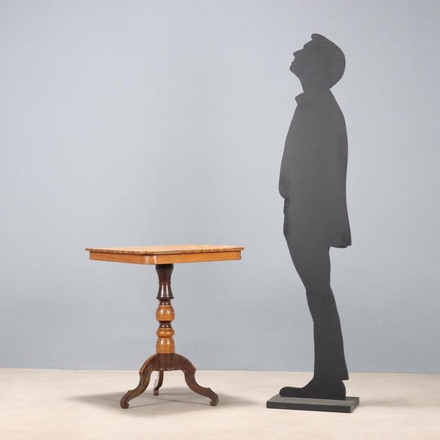Walnut and mahogany coffee table. Square top with checkerboard maple and walnut inlay, purfling on the underside of the...