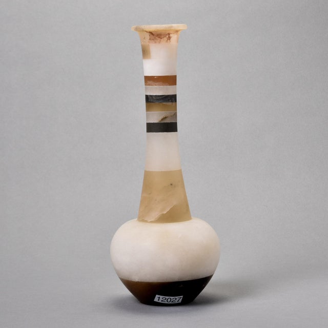 This is a new, tall white alabaster vase found in Italy. Created and designed by a member of a multi-generational family...