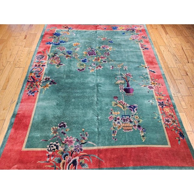 Vintage Chinese Art Deco hand-knotted rug is a striking example of early 20th-century design and craftsmanship. It...