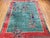 Vintage Chinese Art Deco hand-knotted rug is a striking example of early 20th-century design and craftsmanship. It...